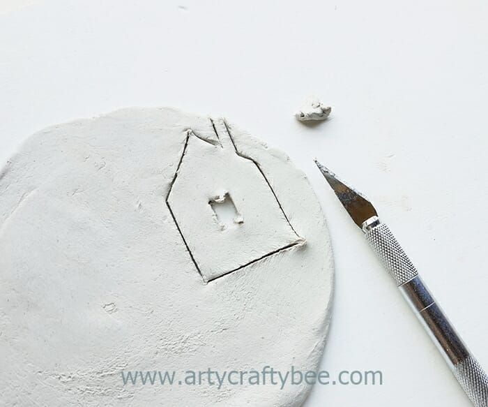cu the clay using a cutting knife