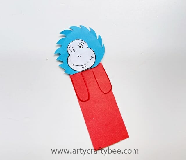 6 glue the thing 1 and thing 2 head on the bookmark